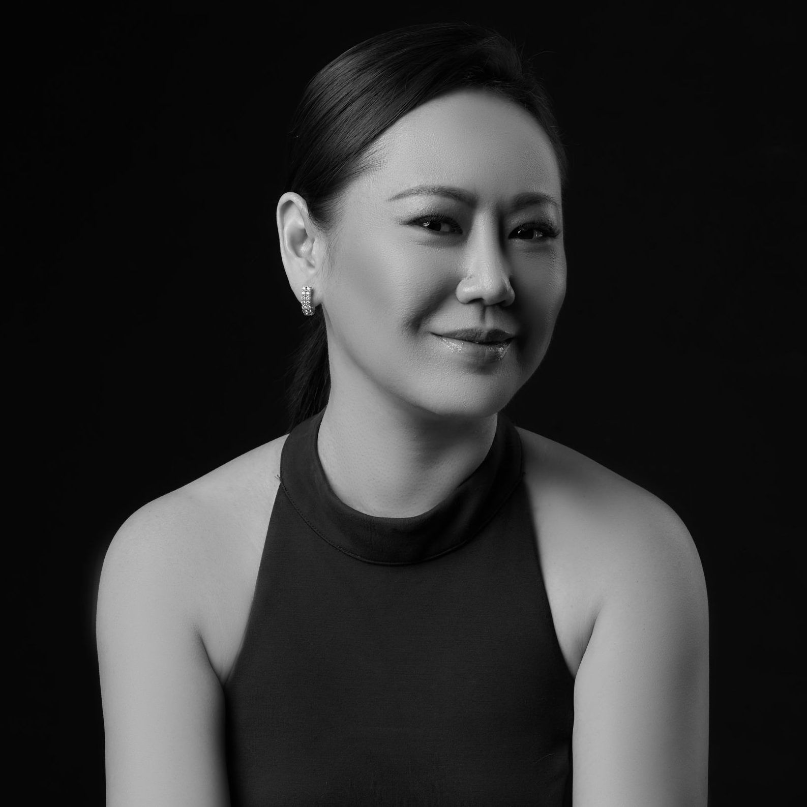 
                        Yanni Tan
