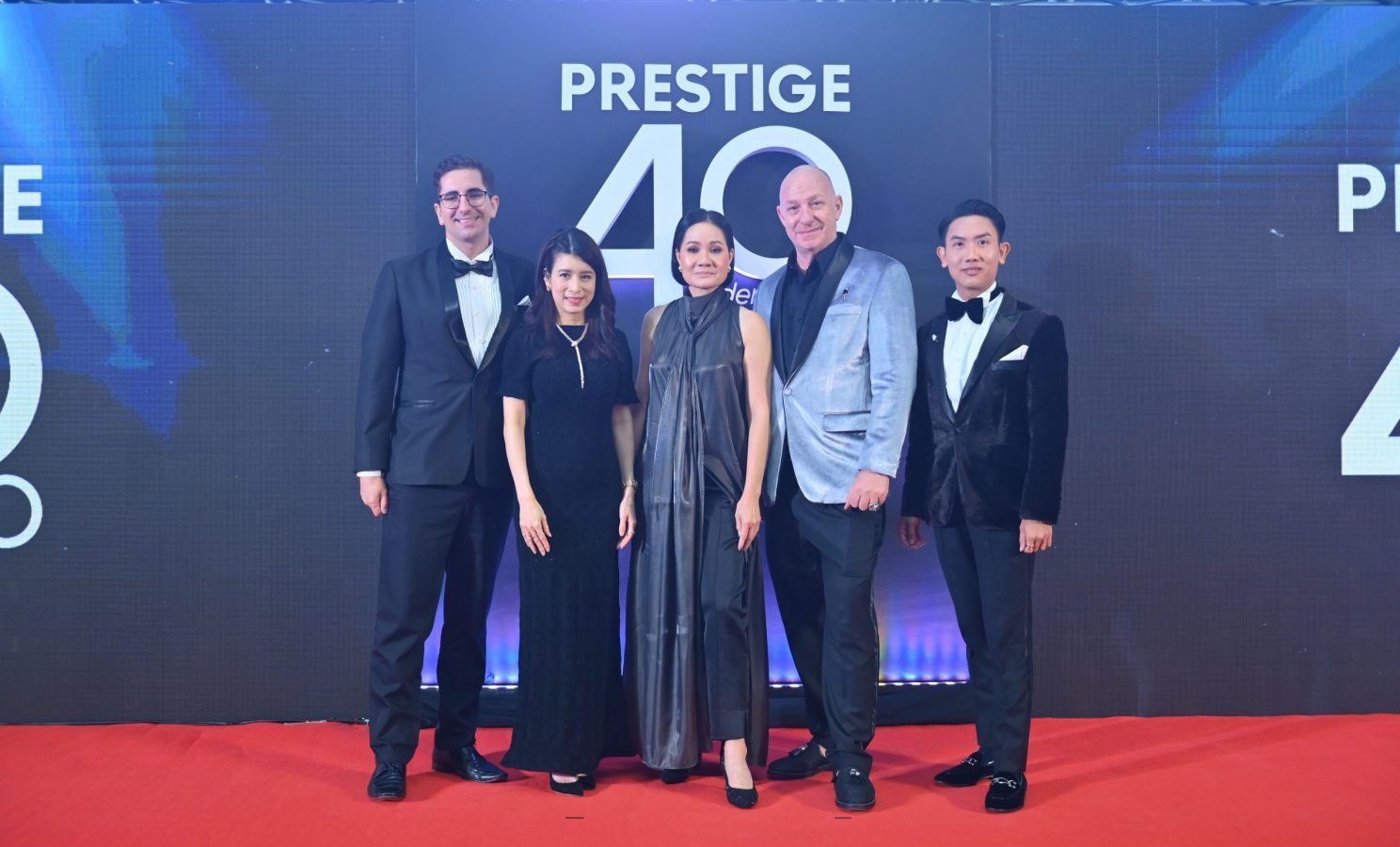 BurdaLuxury's Managing Director and Managing Editor of Prestige Thailand pose with partners