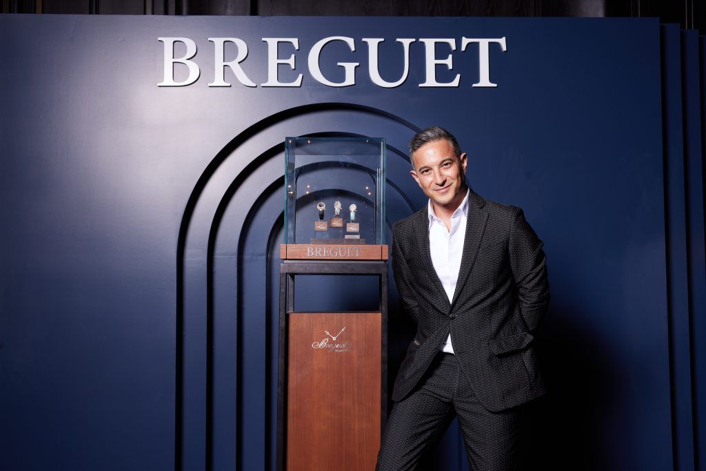 Jay Spencer poses with Breguet backdrop