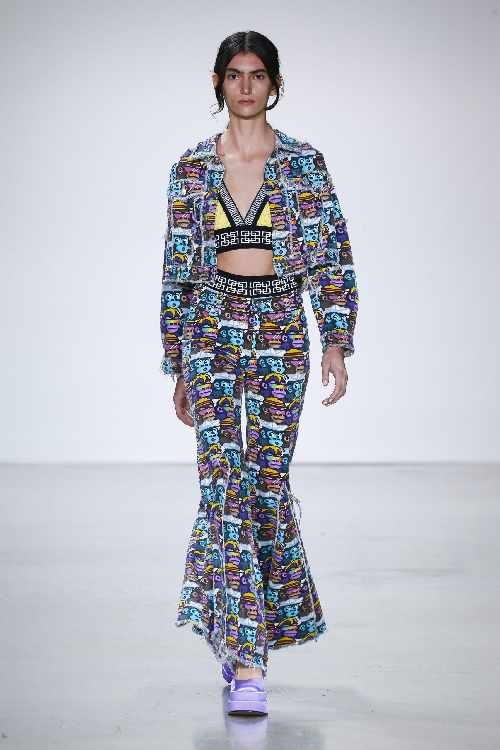 Female model with printed jacket and trousers at Metaverse, Past, Present, and Future SS23 show at New York Fashion Week 