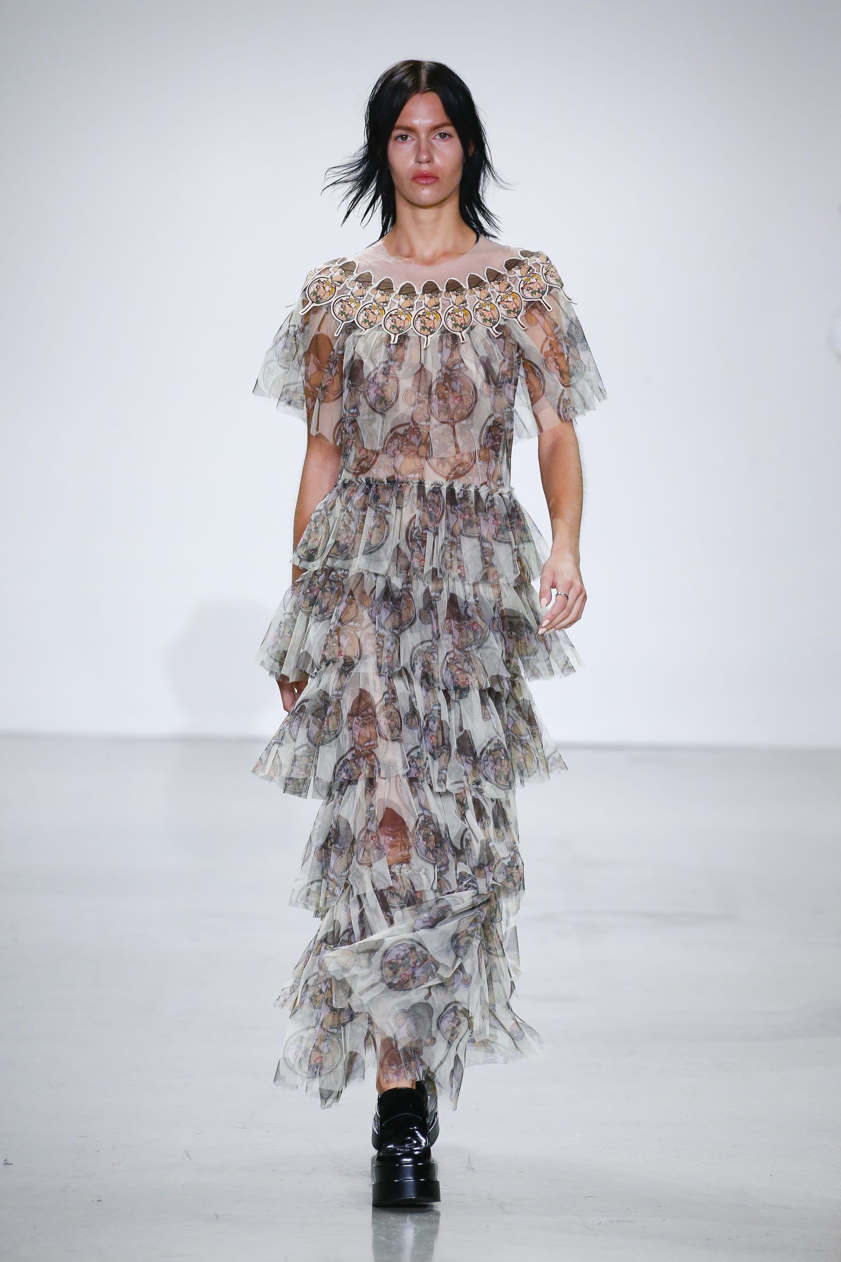 Model wearing a long flutter dress at Vivienne Tam’s Metaverse, Past, Present, and Future SS23 show at New York Fashion Week