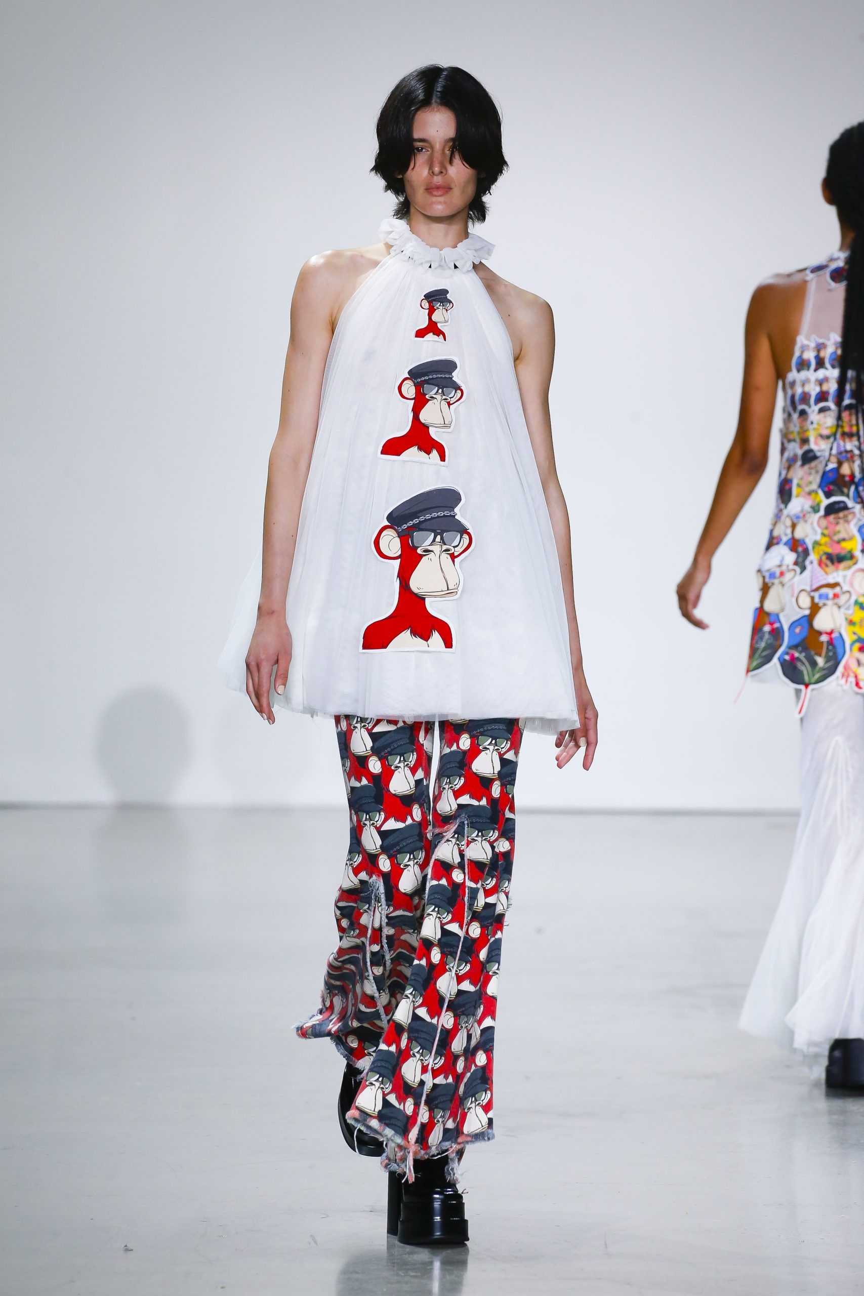 Model wearing Bored Apes collection at Vivienne Tam’s Metaverse, Past, Present, and Future SS23 show at New York Fashion Week