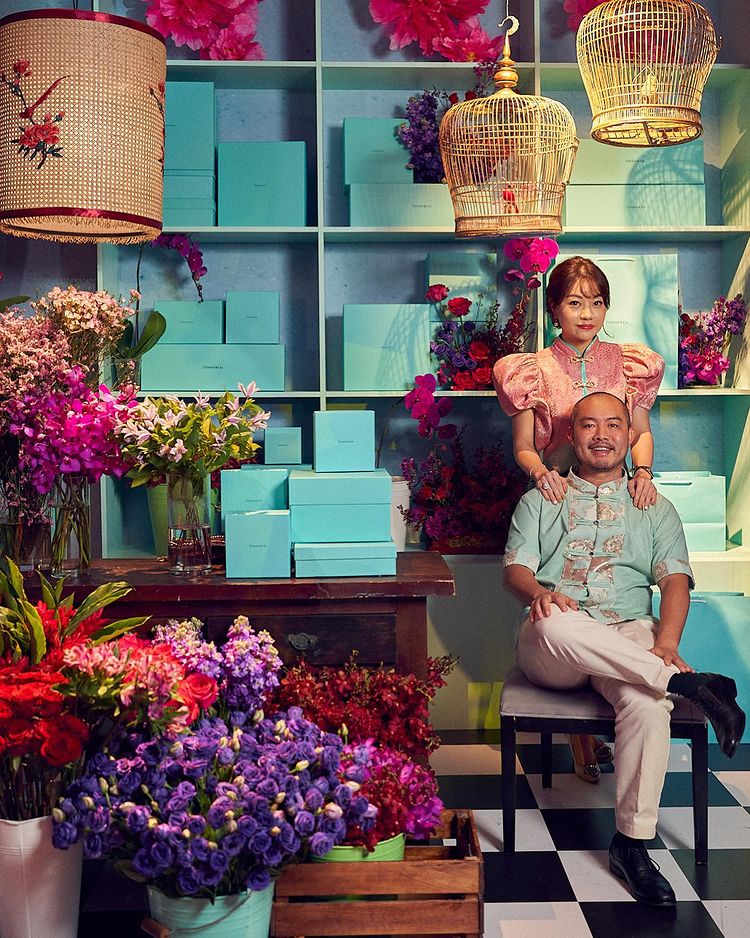 Guests pose with the Tiffany & Co. Florist backdrop at PINCNY2023 event